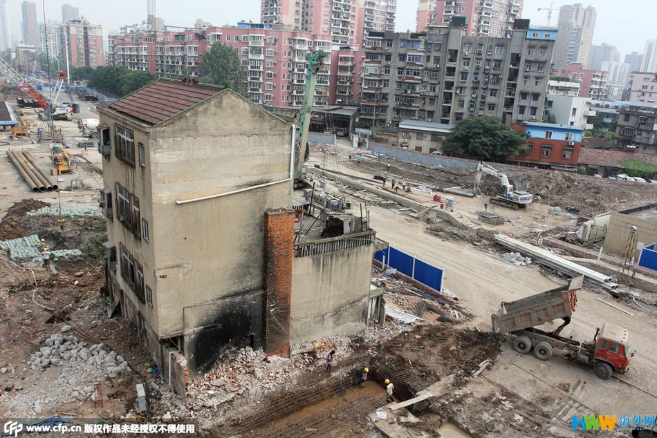 武漢一地鐵線路因釘子戶(hù)而改線，城市發(fā)展與個(gè)人權(quán)益的博弈，城市發(fā)展與個(gè)人權(quán)益博弈，武漢一地鐵線路因釘子戶(hù)改線揭秘