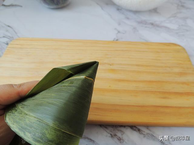 包粽子時(shí)，關(guān)于米的浸泡時(shí)間你了解多少？——關(guān)于包粽子米泡制時(shí)間的探討，關(guān)于包粽子米泡制時(shí)間的探討，浸泡時(shí)間對(duì)粽子口感的影響解析